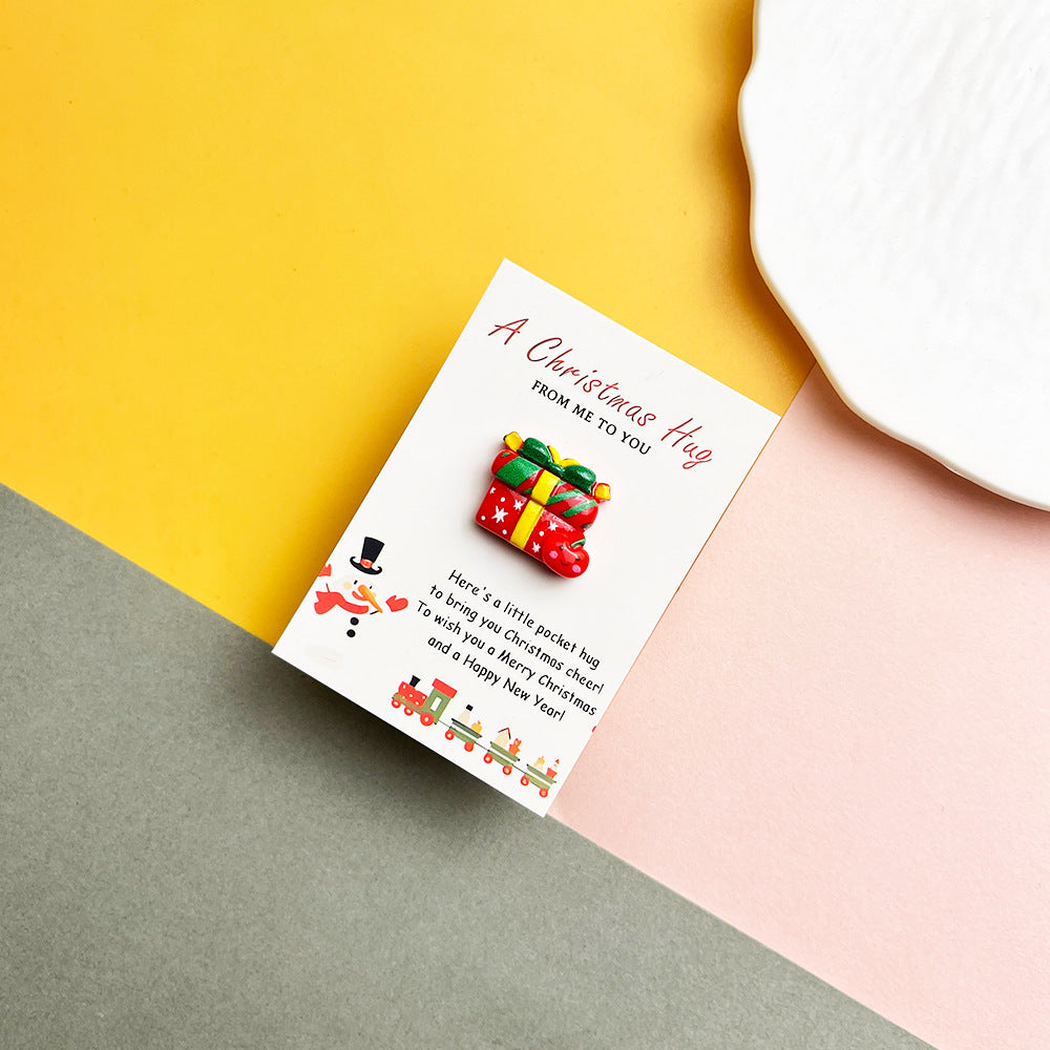 Wrapped gifts and stocking pocket hug on a Christmas message card