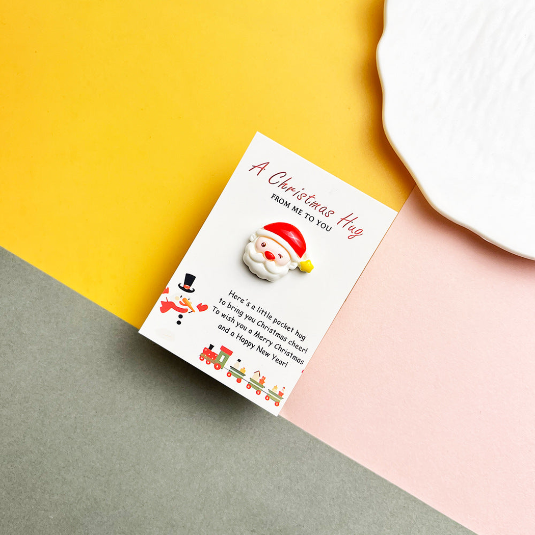 Santa face pocket hug on a Christmas message card