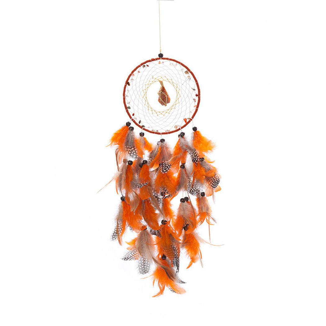 Orange dreamcatcher with a circular web-like center and hanging feather-look elements