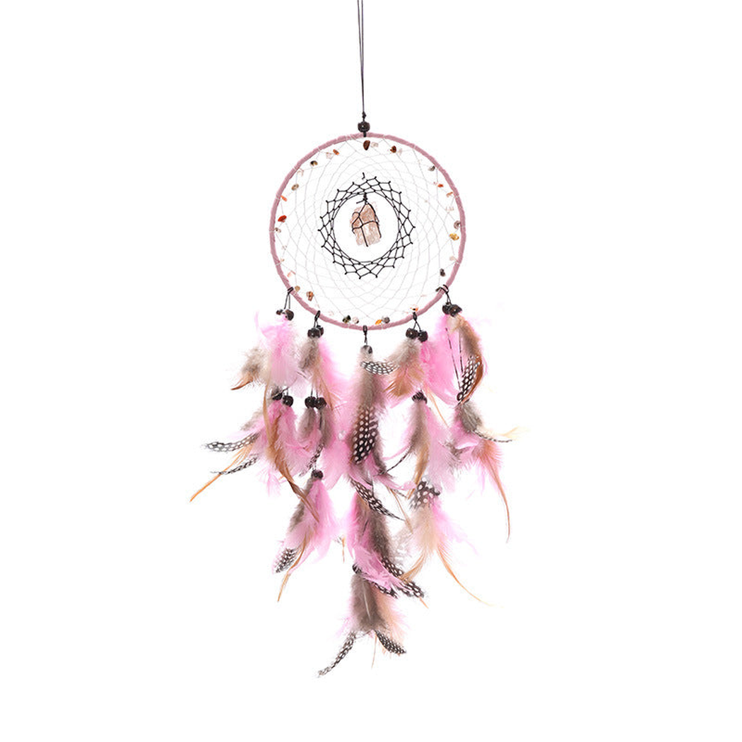Pink dreamcatcher with a circular web-like center and hanging feather-look elements