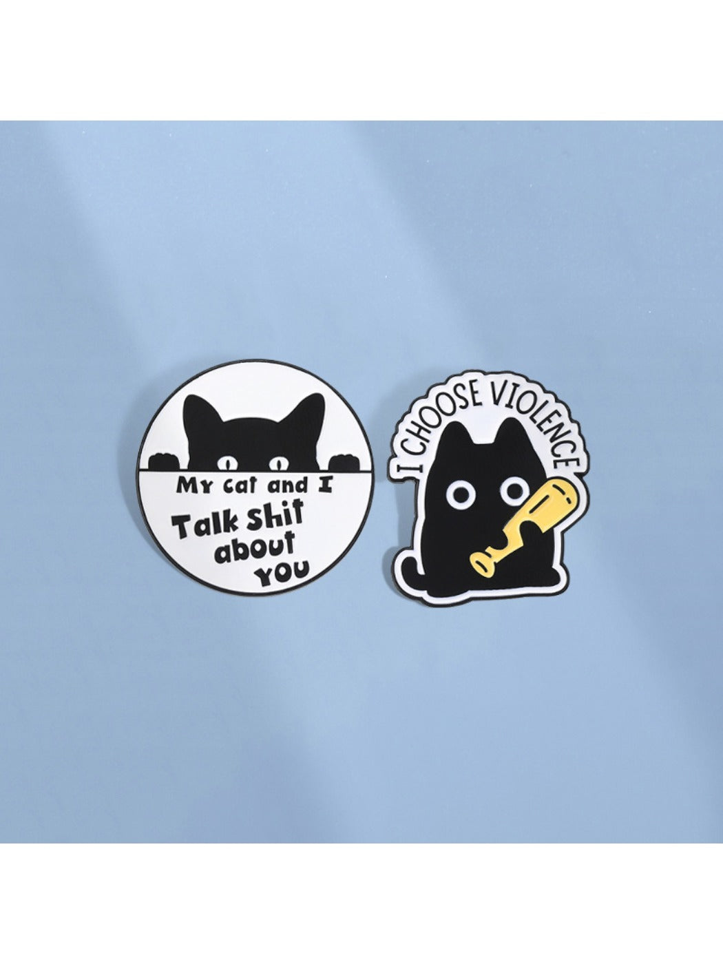 Pinori fashion accessory cat pin displayed on a black fabric surface