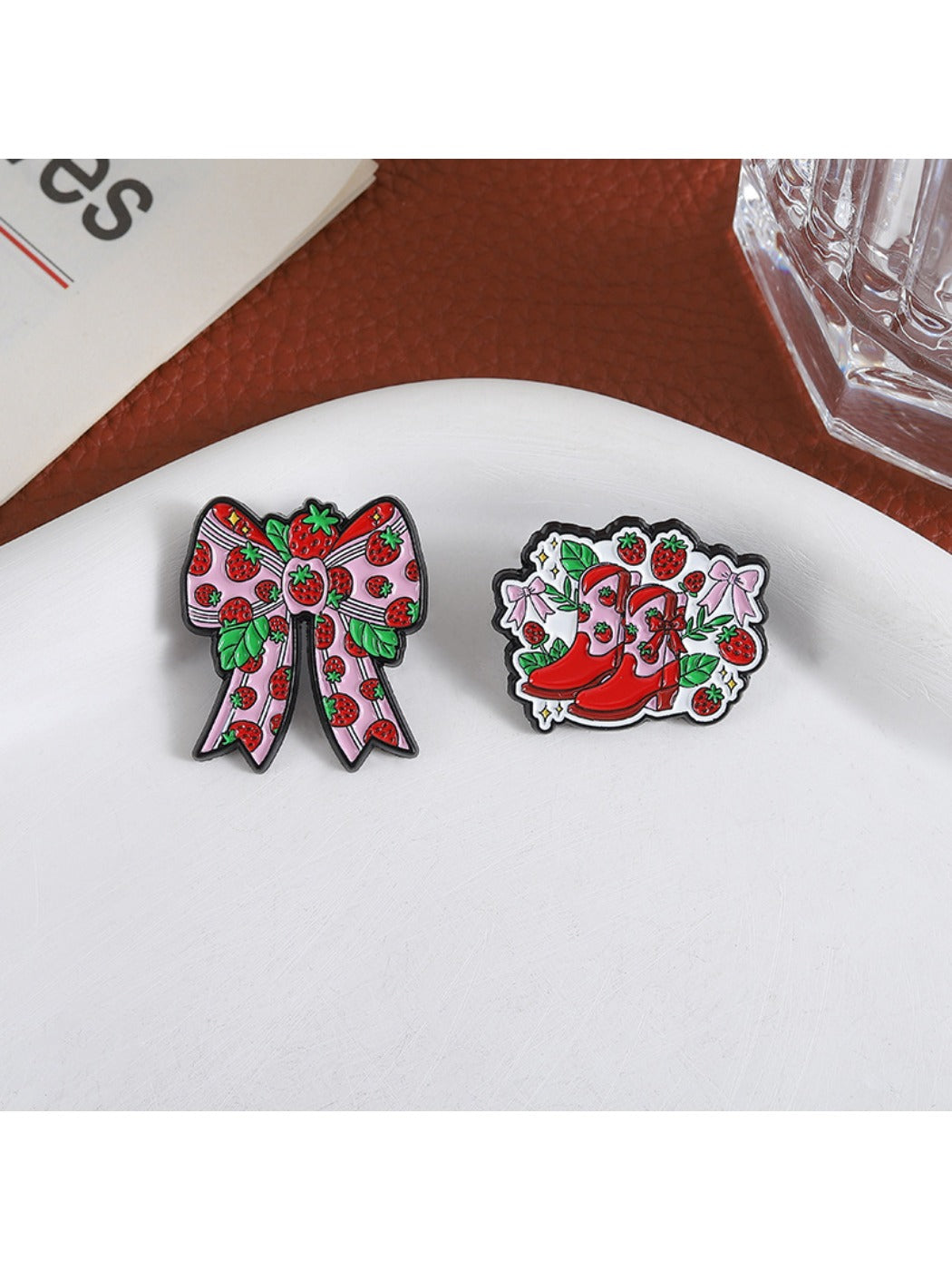 Pinori strawberry fashion pin displayed on a white background