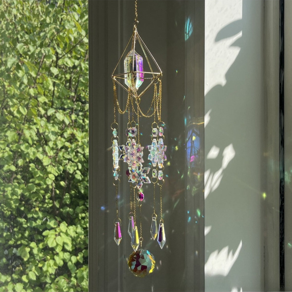 Close-up of Somnira Snowflake Prism Suncatcher showing detailed prism facets