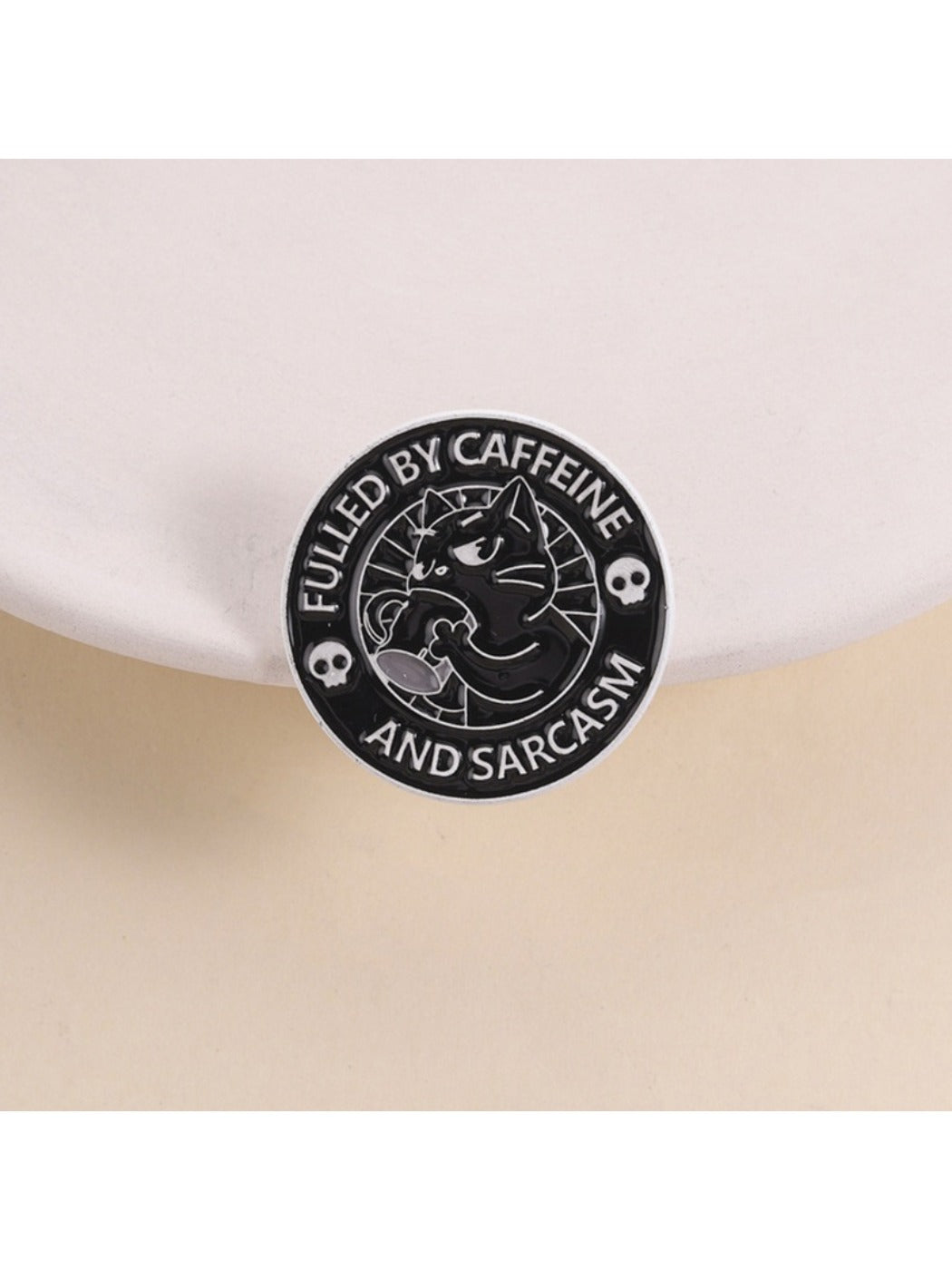Pinori black cat brooch holding a coffee cup, enamel and metal design