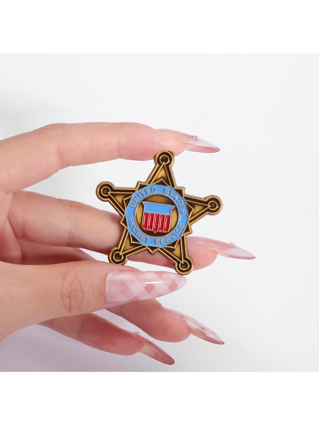 Pinori five point star brooch paired with casual outfit