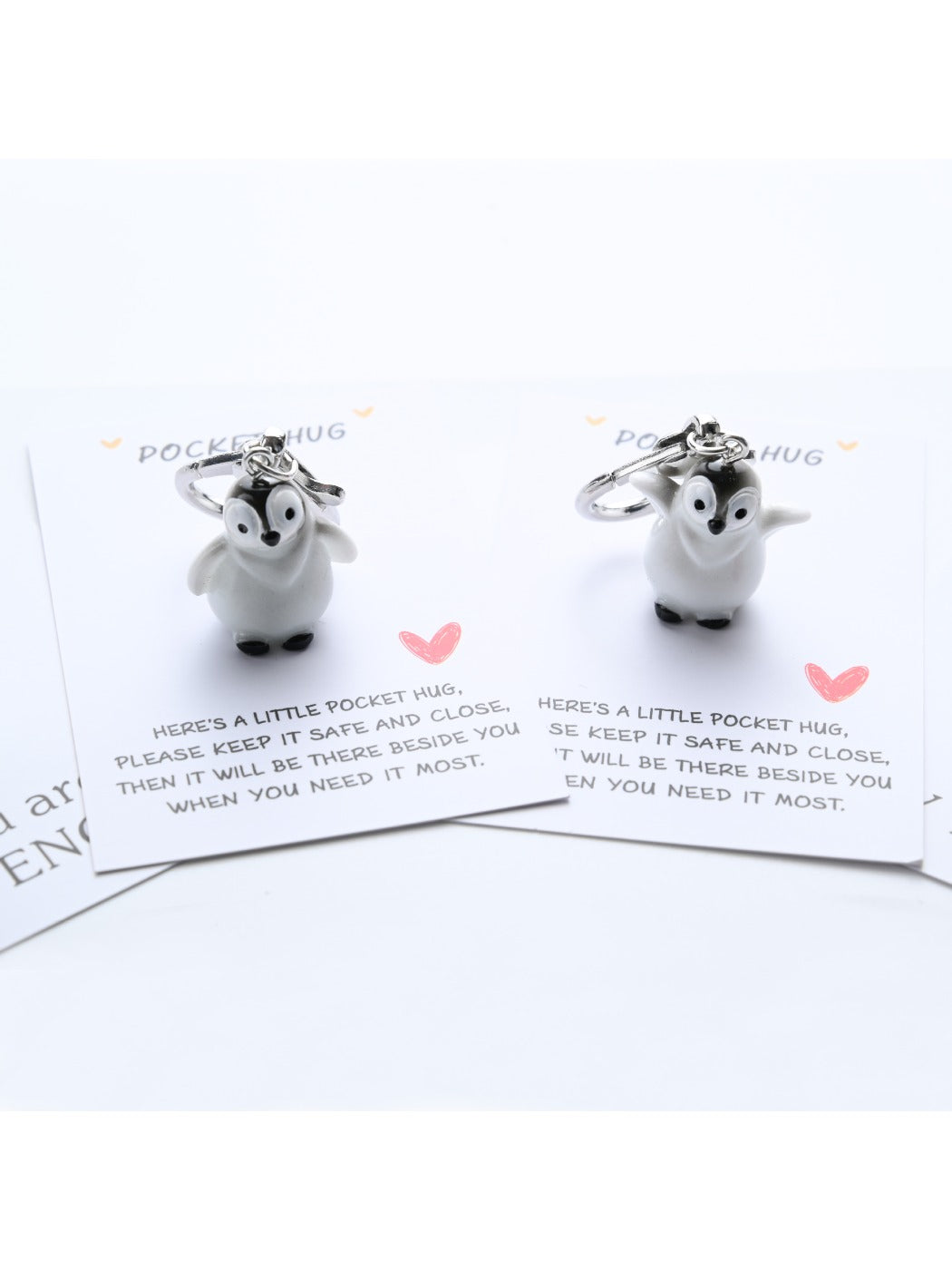 Taphug - Pocket Hug Penguin Keychain