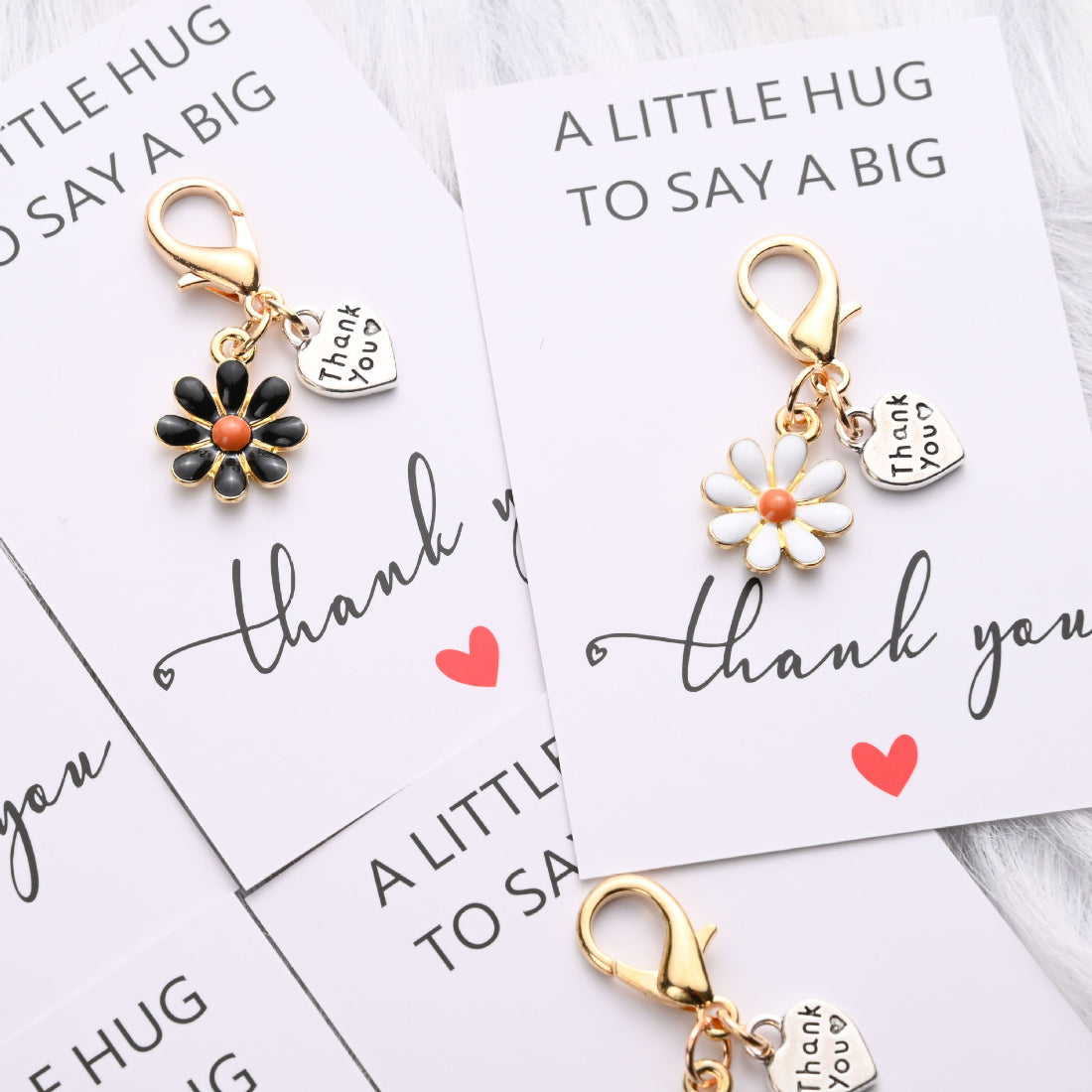 Close-up of Taphug Daisy Heart Thank You Pocket Hug card with daisy illustration