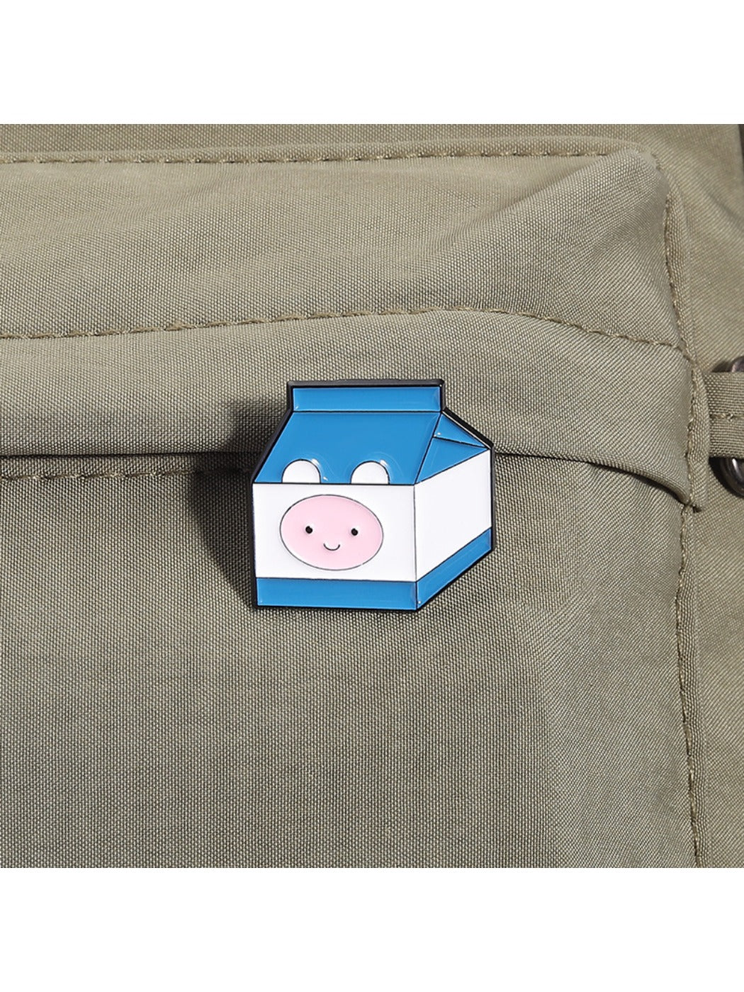Side view of Pinori lapel pin highlighting metal edges and enamel finish