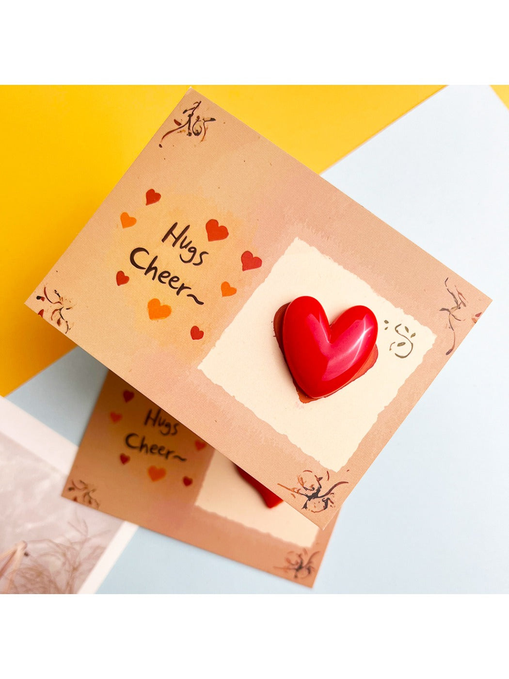 Side view of Taphug Pocket Hug Heart Love with heart motif visible