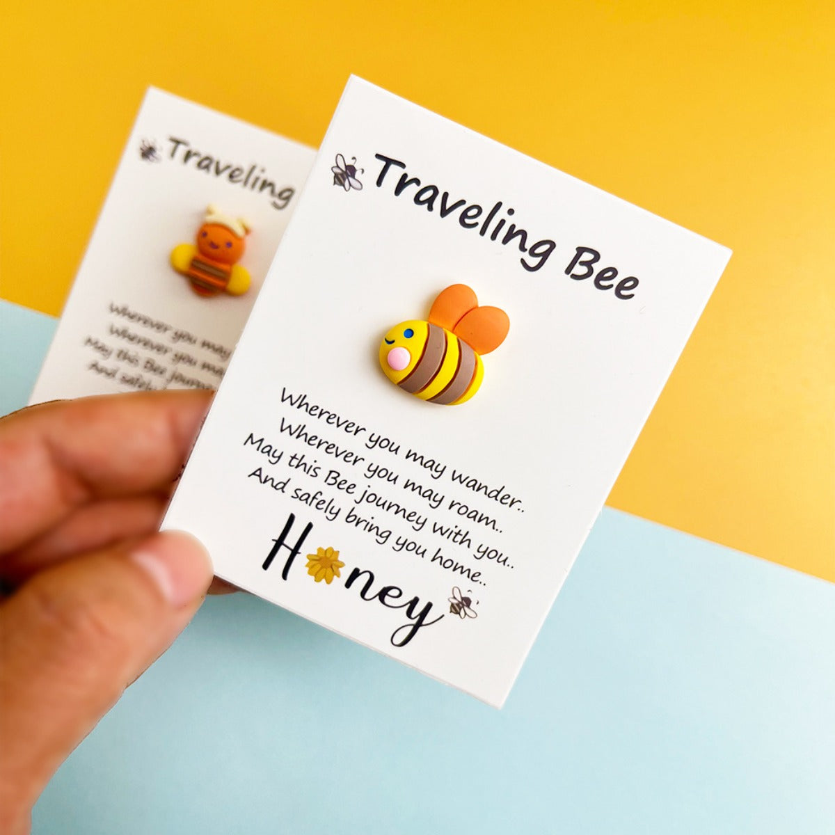 Taphug Pocket Hug Traveling Bee plush toy on a white background