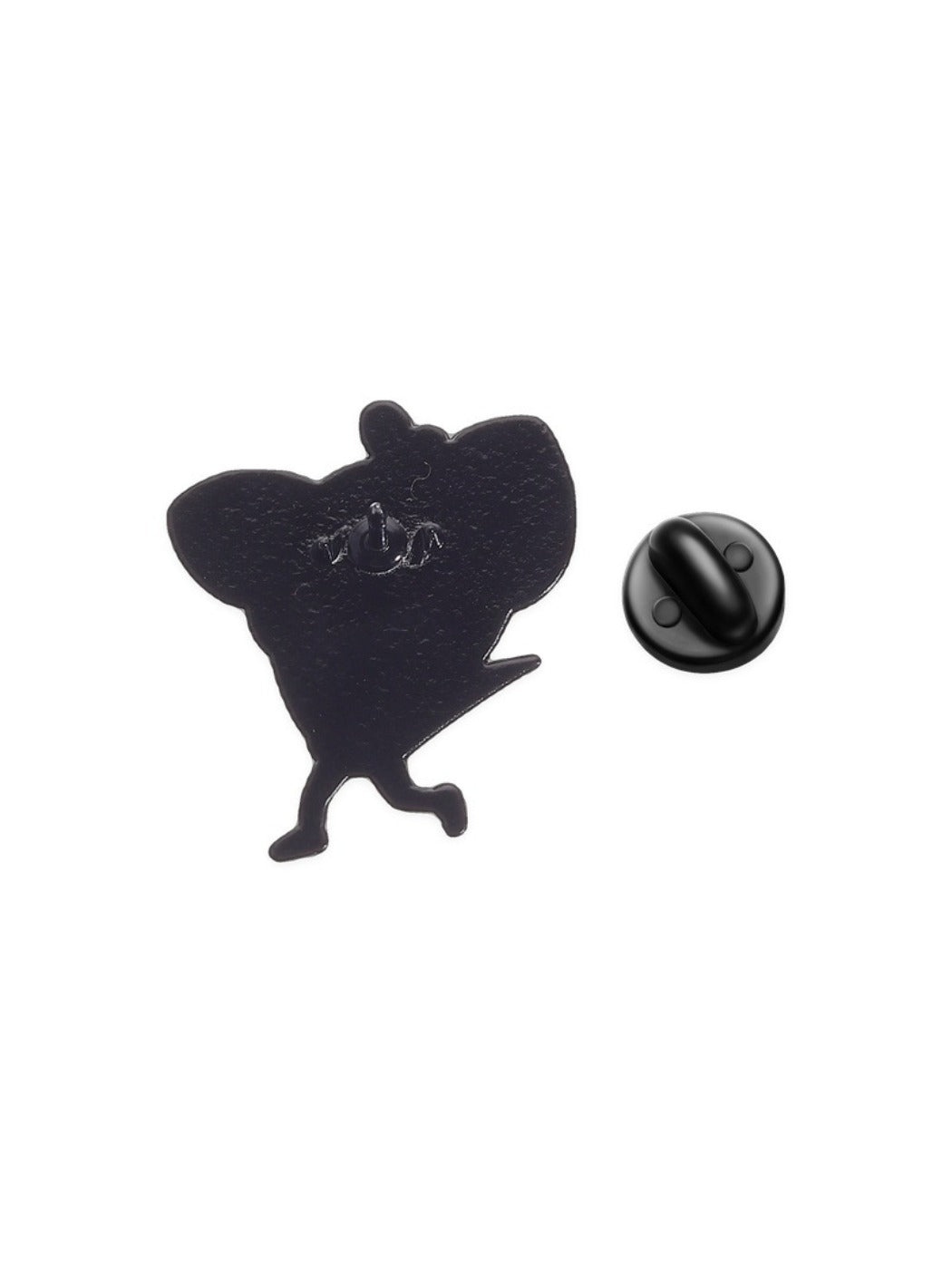 Pinori chicken brooch worn on a denim jacket lapel