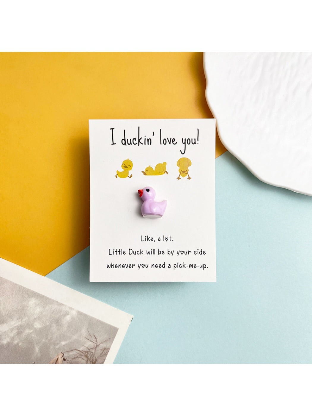 Taphug resin duck pocket hug card with a keychain attachment