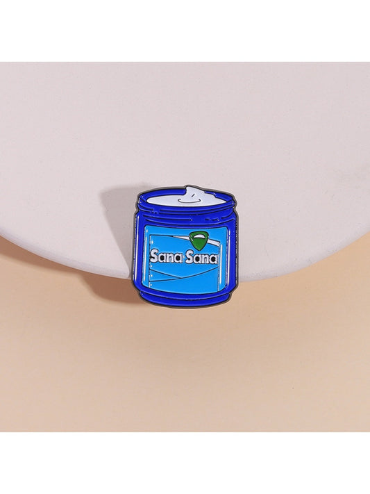 Close-up of Pinori blue cream jar metal brooch with detailed enamel finish