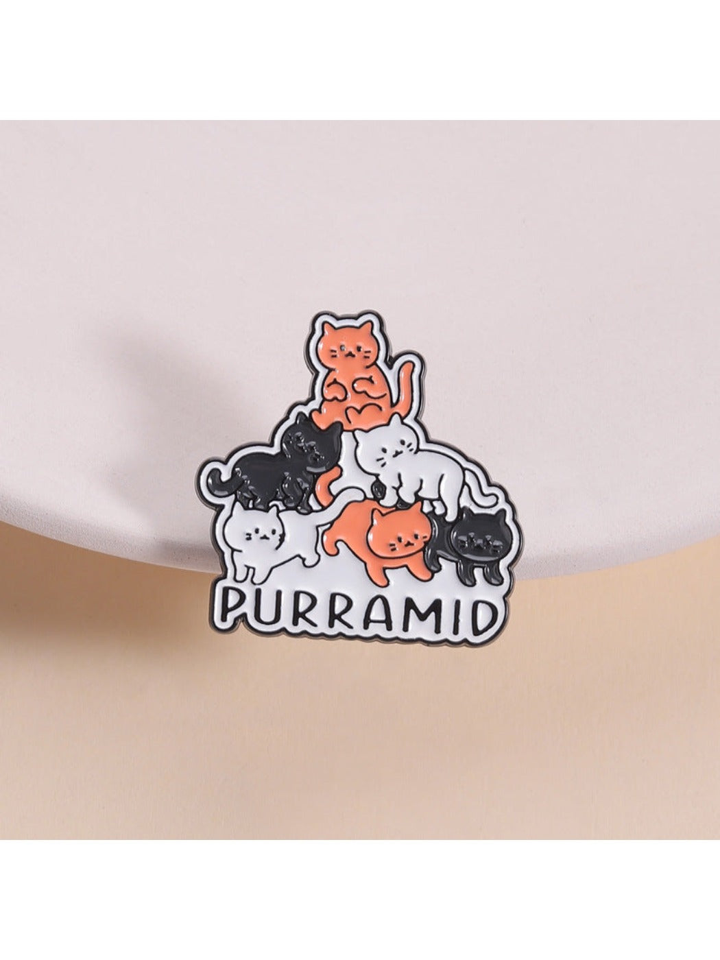 Pinori Cat Pyramid Brooch showing front view of geometric cat design