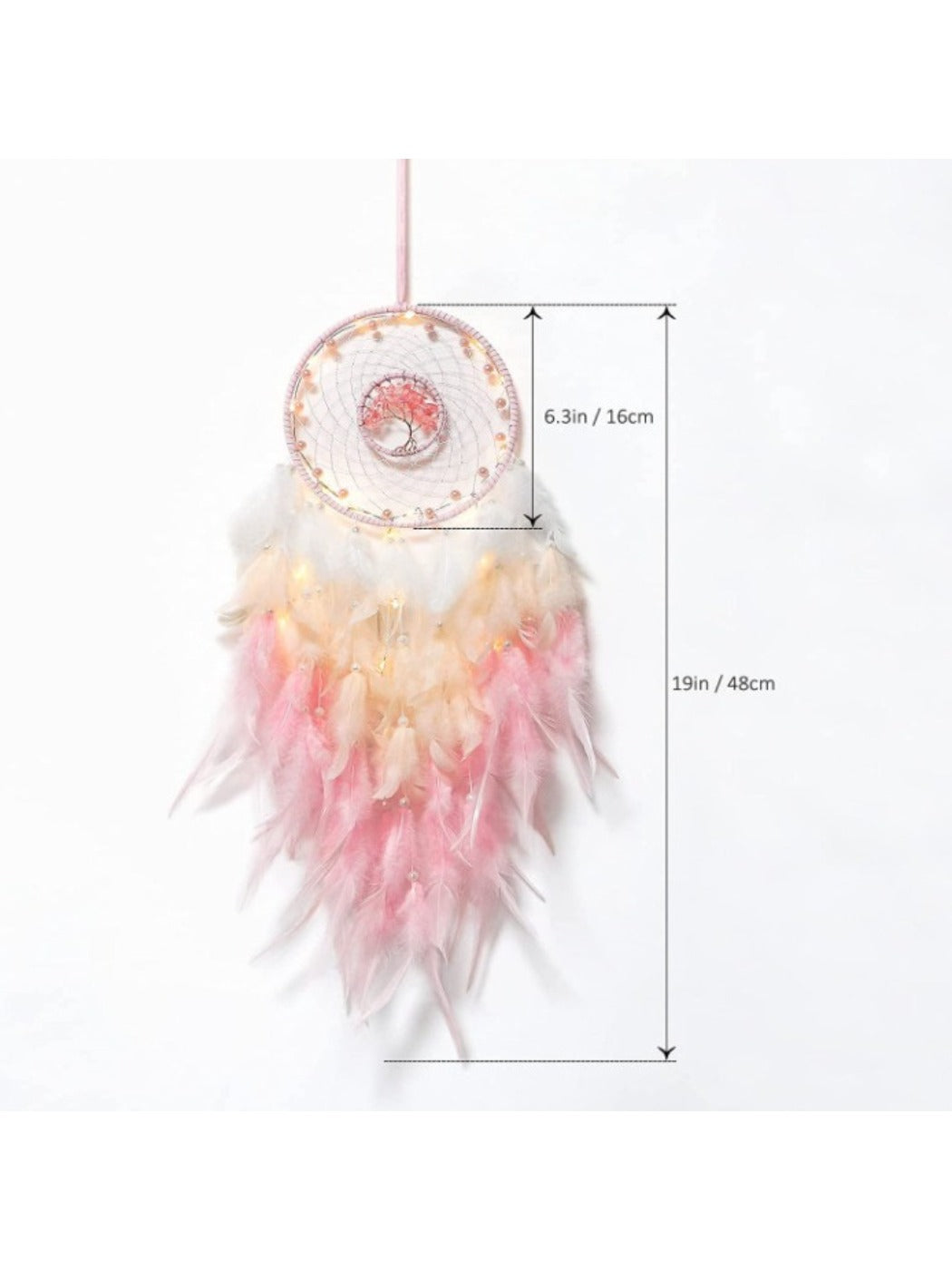 Full view of Somnira Bohemian Tree of Life wind chime hanging outdoors