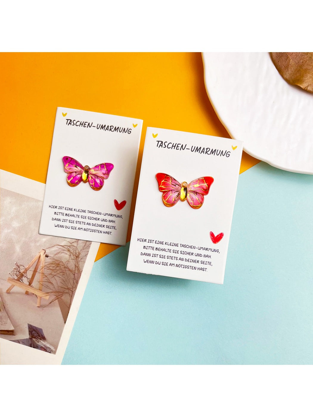 Close-up of gradient butterfly illustration on Taphug pocket hug card