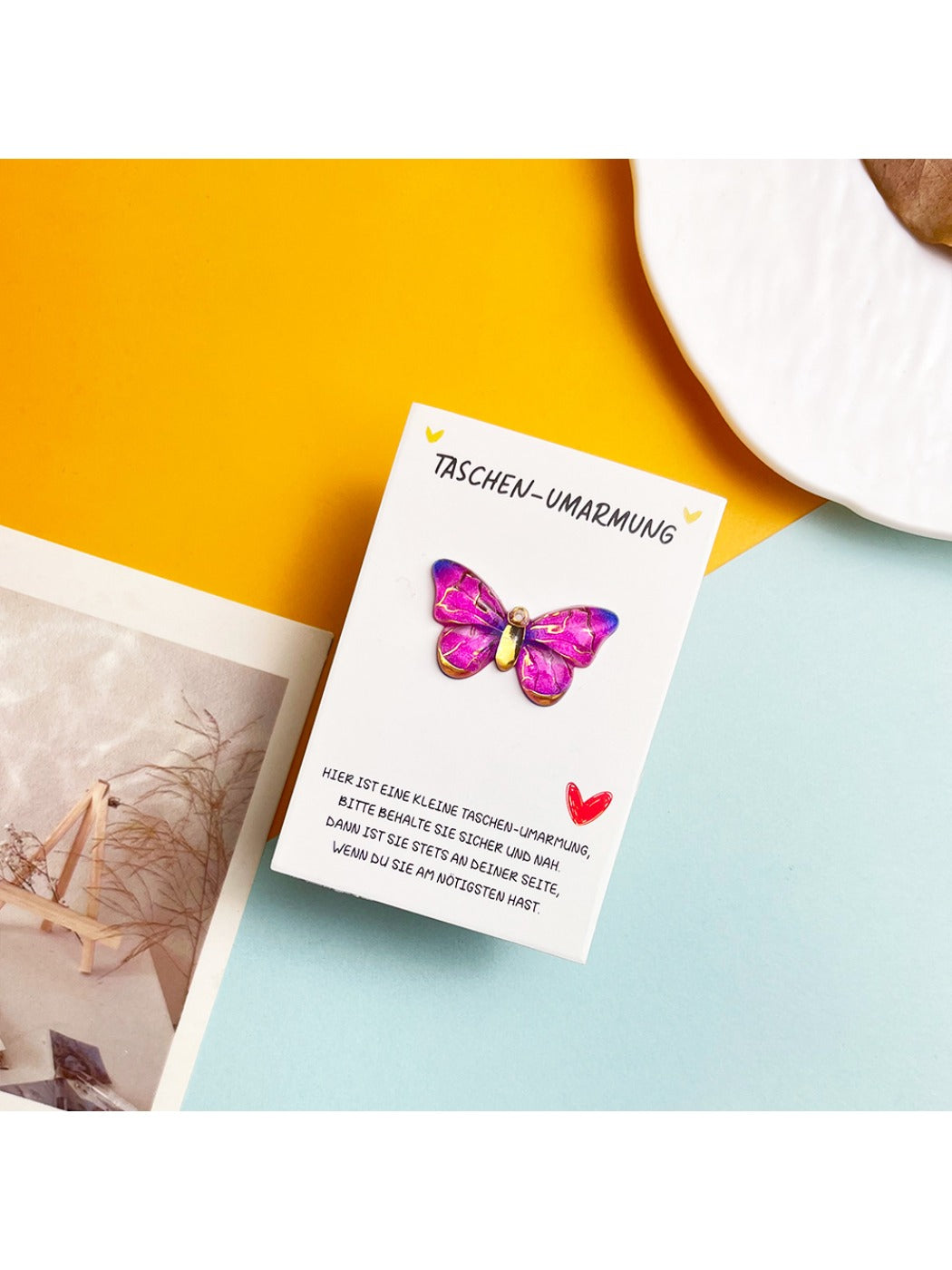 Taphug card partially opened revealing butterfly wings inside pocket