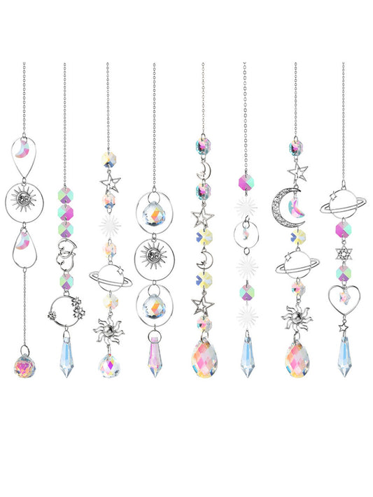 Somnira Galaxy Crystal Dream Catcher hanging with blue and purple crystals