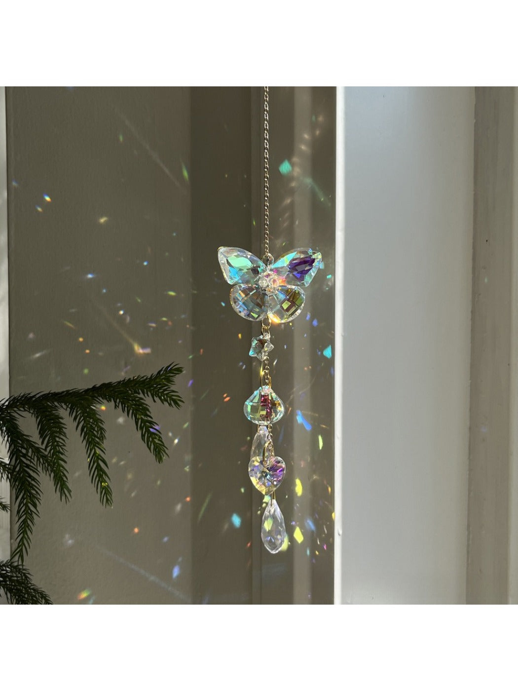 Close-up of butterfly detail on Somnira Shine Dream Catcher with delicate bead accents
