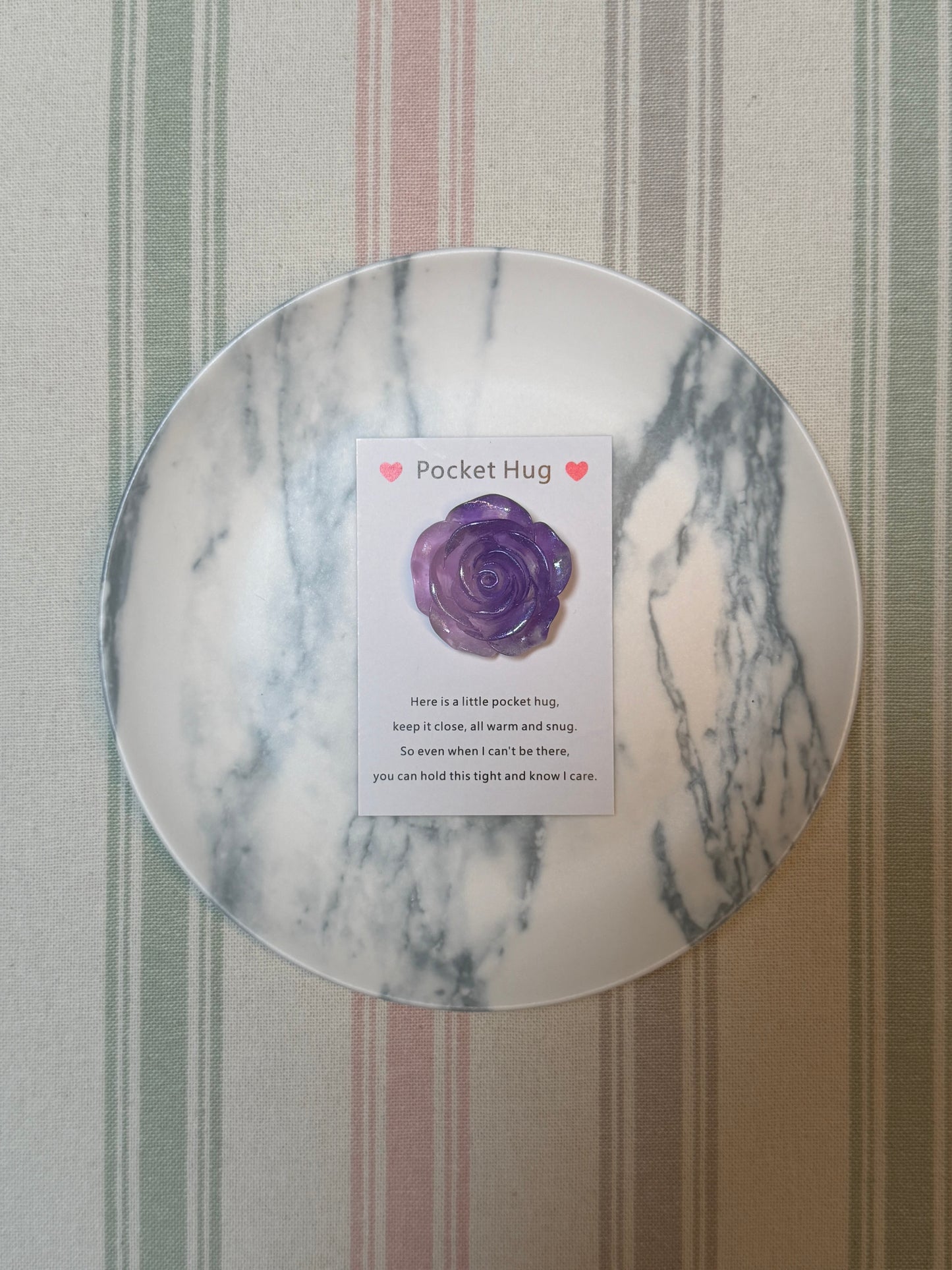 Rose design pocket token and printed card laid flat