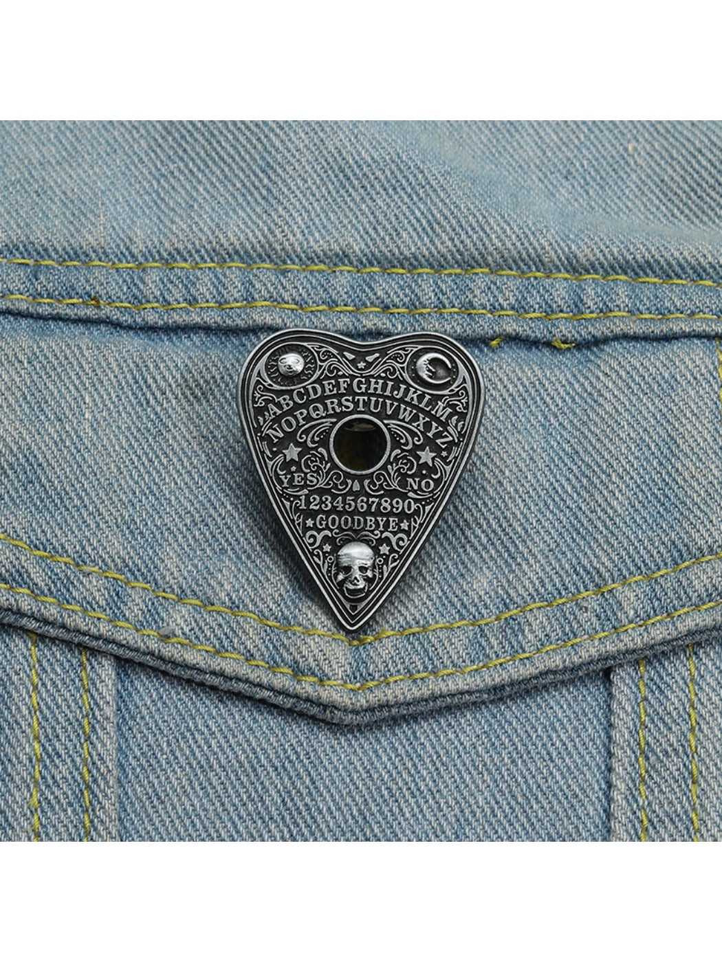Pinori black punk metal heart pin badge with metal clasp visible